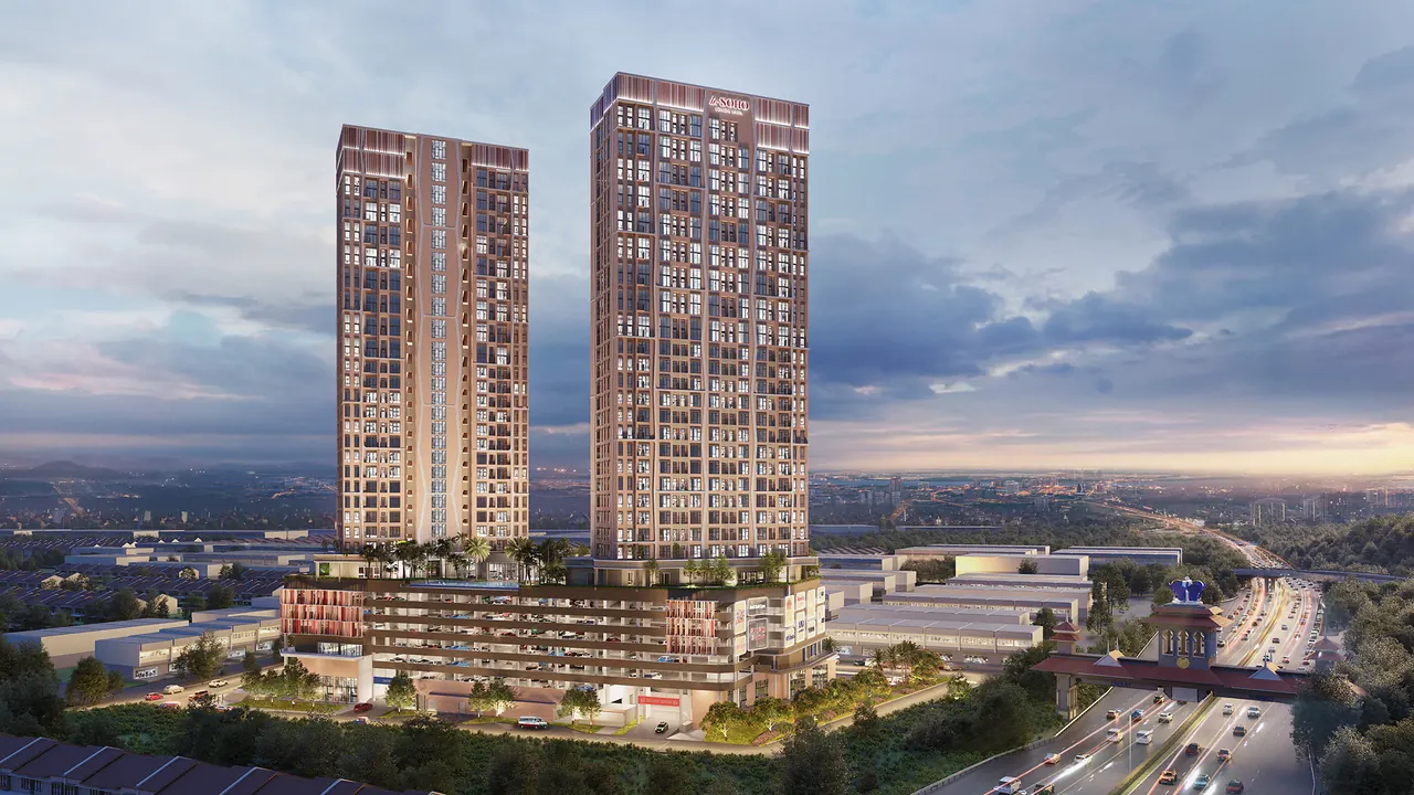 A-SOHO @ Johor Jaya: two 22-storey towers in warm terracotta cladding at dusk.